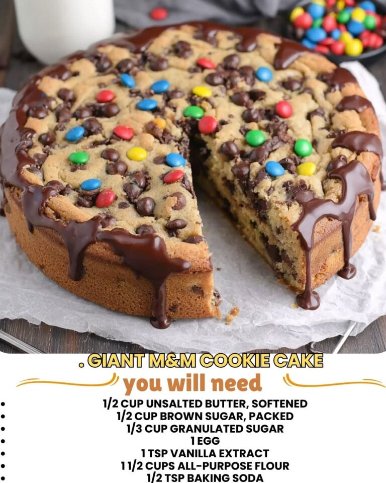 Giant M&M Cookie Cake with colorful M&Ms throughout